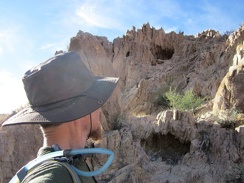 A series of cavelets is clustered in a hill along this wash in the Kelso Dunes Wilderness