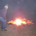 The fire is burning nicely, but it's getting late, so I'm thinking about letting it die down and retreating to my tent