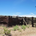 I stop briefly at an old corral behind which is an alternate old road leading to Malpais Spring