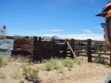 I stop briefly at an old corral behind which is an alternate old road leading to Malpais Spring