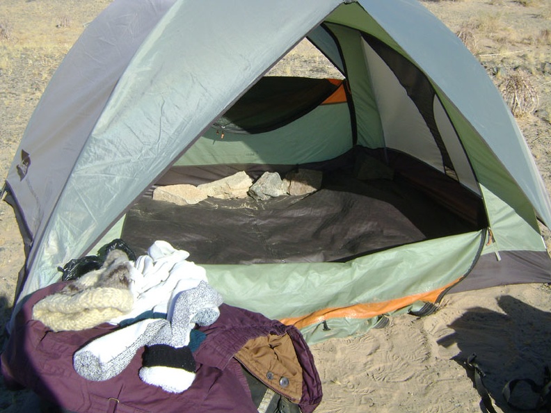 The last items to remove are the large rocks that I placed inside the tent last night to keep it from blowing over again