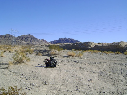 Tire tracks go everywhere at the end of Old Kelso Road where it meets Jackass Canyon at the power lines