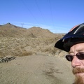 At the top of my little hill, I now get to ride back down the old paved road and return to the gravel of Jackass Canyon