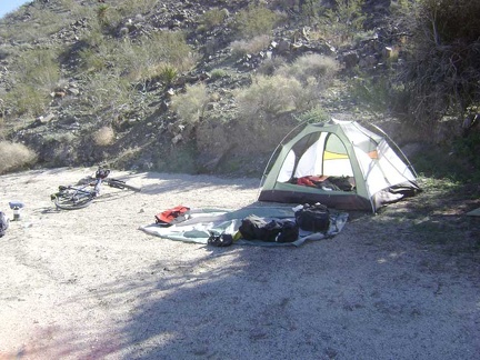 Dismantling the tent; time to move on and continue my bikepacking trip