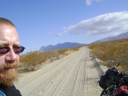 The 10-ton bike reassembled, I'm ready to put my helmet on and start riding up the Kelso Dunes power-line road