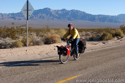 After 45 minutes of slow uphill, I see someone ahead in the road.  Stranded?  No, he's taking photos of the area, and of me