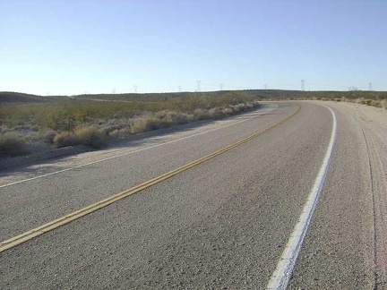 Ah, my 12-mile climb up to the Kelbaker Road summit ends just ahead at the power lines...