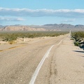 I ride into Mojave National Preserve up Kelbaker Road away from Baker, California