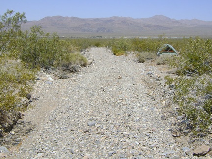 As I approach the tent, I'm overcome by a feeling of disappointment due to not having reached Cornfield Spring