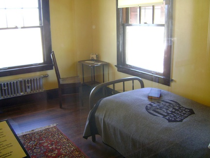 A couple of the small sleeping rooms are furnished in the simple style of the period