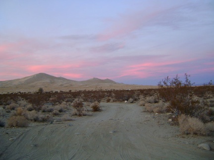 I decide that the best choice is to simply leave Kelso Dunes and its campers behind and head west down the power-line road