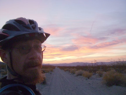 The Kelso Dunes power-line road is getting sandy, so I'm now walking the bike a bit; time to find a campsite!