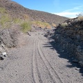 I continue hiking up "South Broadwell Wash," following an old set of dirt-bike tracks