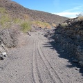 I continue hiking up &quot;South Broadwell Wash,&quot; following an old set of dirt-bike tracks