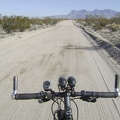 I ride back up the road 1.25 miles to the Kelso Dunes trailhead