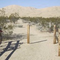 I lock the bike to the fence at the Kelso Dunes trailhead