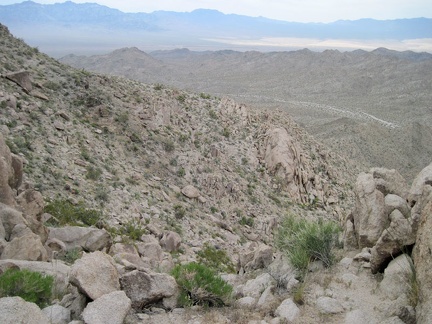 I zigzag across the slope, approaching a drainage that I identify on my GPS as a possible descent route