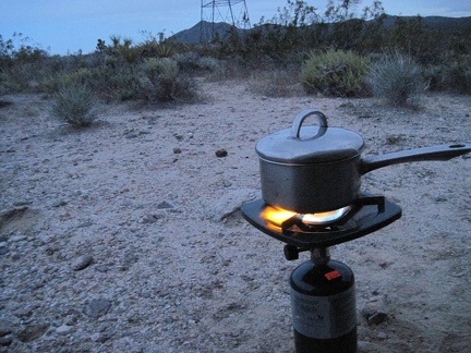 I boil water for tonight's add-water-to-bag meal, and then wind down and enjoy the food coma; it rains for a while later on!