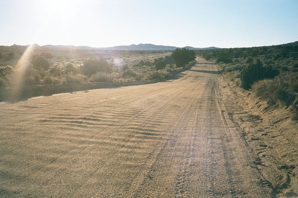 Further beyond Watson Wash, Cedar Canyon Road rides across firm ground again