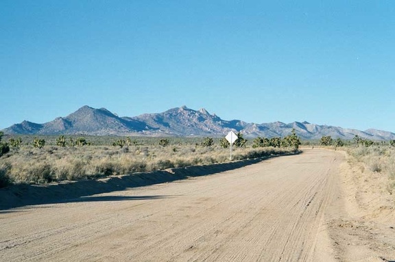 For about six miles, Cedar Canyon Road heads straight westward, after which several sharp corners appear in the road