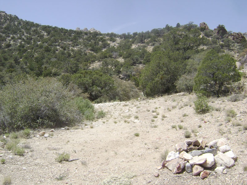 I come across another campsite with a fire ring near the road