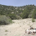 I come across another campsite with a fire ring near the road