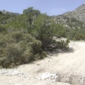 Road users have placed rocks in this gully to facilitate passage over it