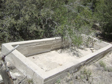 I spot an old cistern along the road