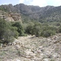 A little higher, I approach a face-like rock formation in the foreground at my left