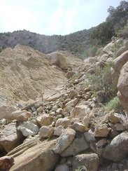 It appears that rock, silt and wood debris tumbles continually down into Keystone Canyon from the old mine site