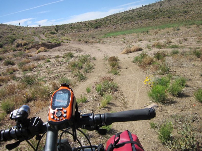 Approaching the dry reservoir on Castle Peaks Road, I see more of my bicycle tracks from three days ago