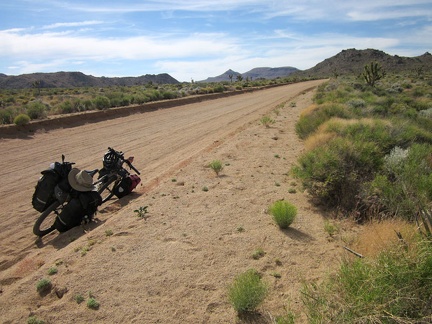 The 10-ton mountain bike slowly gains altitude on Cedar Canyon Road