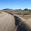I'm back out on a main road now (Black Canyon Road this time) and pass the windmill at Holliman Well