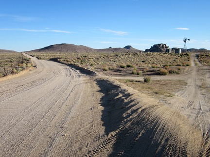 I'm back out on a main road now (Black Canyon Road this time) and pass the windmill at Holliman Well