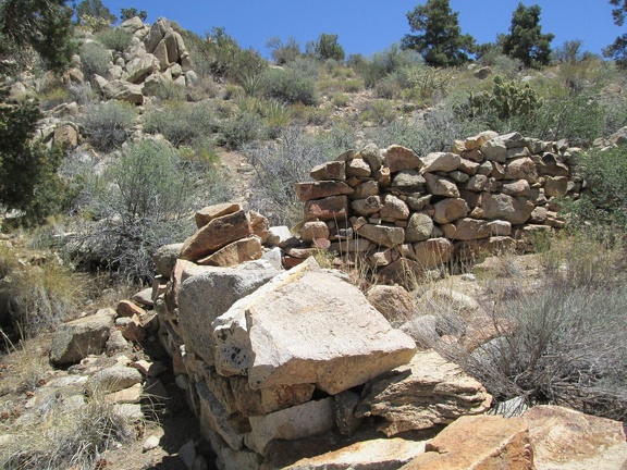An old rock wall sits above Lecyr Spring