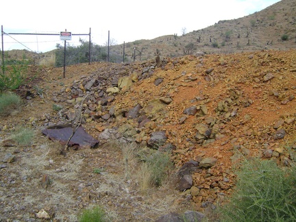 I reach the orange tailings pile at Columbia Mine and see a &quot;danger&quot; sign