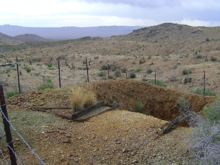 I don't know how deep this mine hole is at Columbia Mine, Macedonia Canyon, Mojave National Preserve