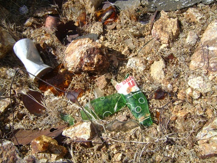 An old broken soda-pop bottle, of a brand named Bubble-Up