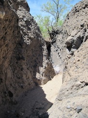 One of several slots to walk through in the canyon above Malpais Spring, Mojave National Preserve