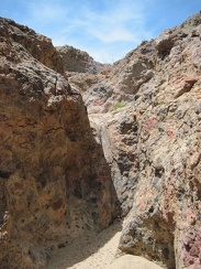 I reach a small dry waterfall to climb