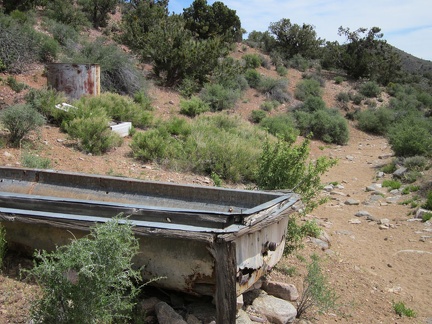 A bit beyond the Pine Spring corral is an old water trough and a rusty water tank