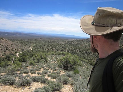 At the top of the blackbrush hill, I turn around for a moment to enjoy the views back down into Piute Valley