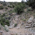 The wash continues to wind its way down from the McCullough Mountains