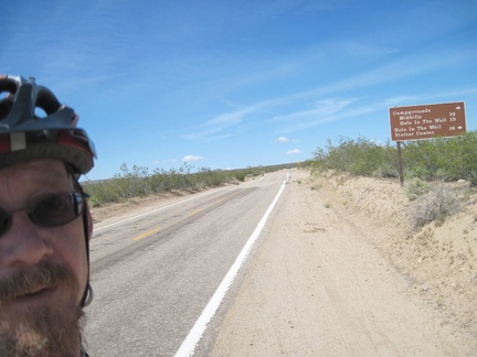 Reaching the sign for Cedar Canyon Road after 15 miles: I'm happy and pull over for a break
