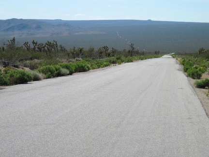 The first 2.5 miles of Cedar Canyon Road rise at about 5% grade, so the views behind me improve quickly