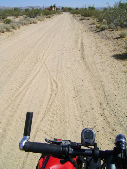 My tires hiss gently as I ride through the sand at the bottom of Cornfield Road toward Kelso Depot