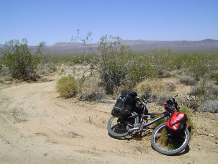 I pedal slowly upward and take a Clif-bar-and-water-break about an hour later off Kelso-Cima Road along the train tracks