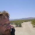 Mojave Road and Marl Mountains in the background, I try my cell phone here, but there's no reception