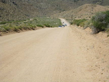 Cedar Canyon Road dips down into Cedar Wash for a couple of miles