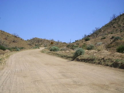 Black Canyon Road's grade here ranges from three to seven per cent, with a bit of loose sand on a hard washboard surface